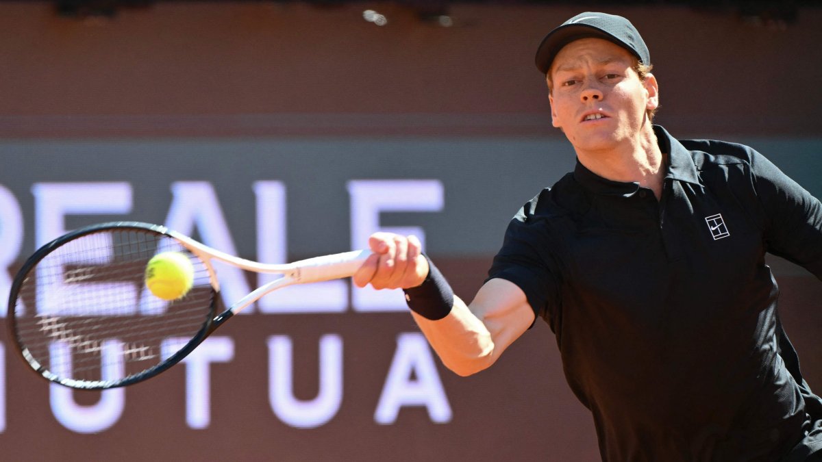 Italy's Jannik Sinner hits a return to Australia's Alexei Popyrin during the ATP Rome Open tennis tournament at Foro Italico, Rome, Italy, May 11, 2026. (AFP Photo)