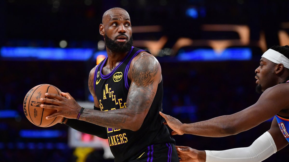 Los Angeles Lakers' LeBron James (L) controls the ball against Oklahoma City Thunder's Luguentz Dort during the first half in game four of the second round of the 2026 NBA Playoffs at Crypto.com Arena, California, U.S., May 11, 2026. (Reuters Photo)
