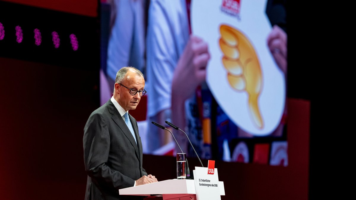 German Chancellor Friedrich Merz delivers a speech during the 23rd Ordinary Federal Congress of the German Trade Union Confederation (DGB), Berlin, Germany, May 12, 2026. (EPA Photo)