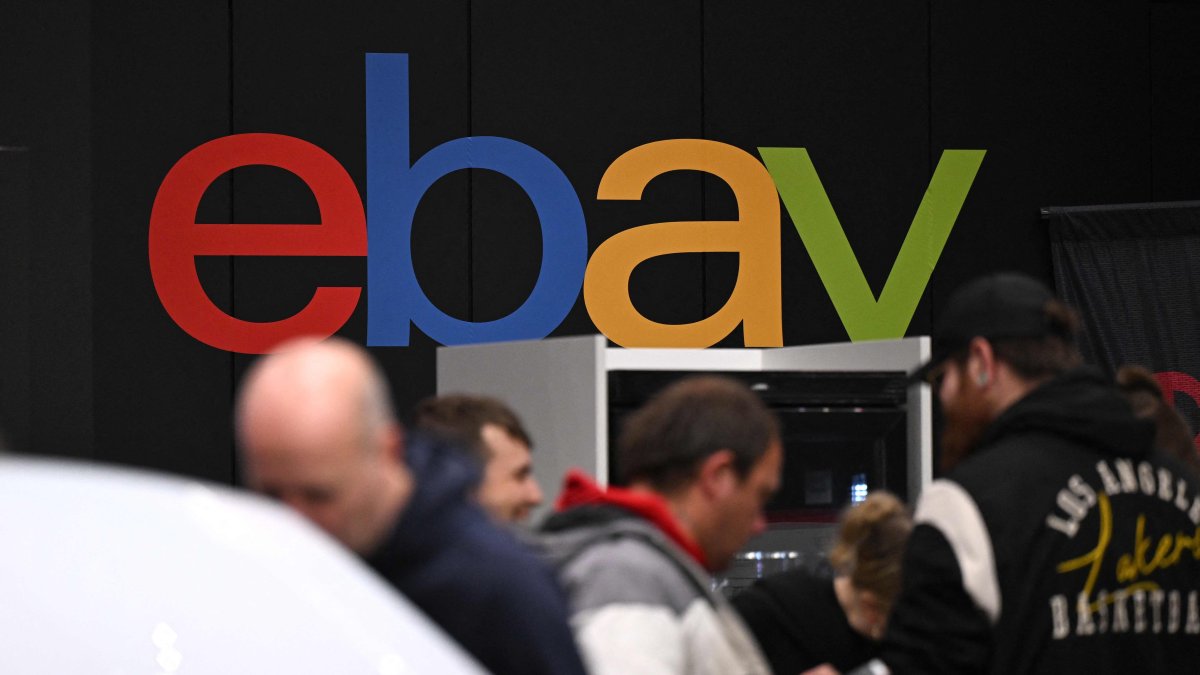 The logo of e-commerce company eBay is pictured at an exhibition booth for vehicle parts at the Essen Motor Show in Essen, Germany, Dec. 4, 2024. (AFP Photo)