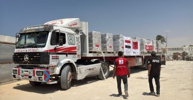 A truck carries humanitarian aid supplies sent by the Turkish Red Crescent to Gaza, in this undated file photo. (DHA Photo)