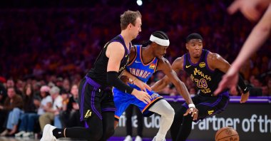 Los Angeles Lakers' Luke Kennard (L) and Rui Hachimura (R) move in for the ball against Oklahoma City Thunder's Shai Gilgeous-Alexander during the second half in game four of the second round of the 2026 NBA Playoffs at Crypto.com Arena, Los Angeles, U.S., May 11, 2026. (Reuters Photo)