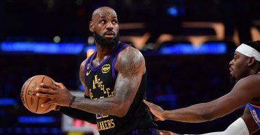 Los Angeles Lakers' LeBron James (L) controls the ball against Oklahoma City Thunder's Luguentz Dort during the first half in game four of the second round of the 2026 NBA Playoffs at Crypto.com Arena, California, U.S., May 11, 2026. (Reuters Photo)