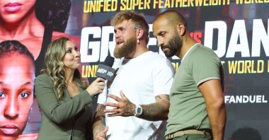 Crystina Poncher interviews Jake Paul (C) and Nakisa Bidarian at the Infosys Theater at Madison Square Garden, New York City, U.S., April 17, 2026. (AFP Photo)