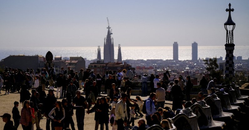 Tourists enjoy the Park Guell, designed by Catalan architect Antoni Gaudi, during the Holy Week in Barcelona, Spain, April 1, 2026. (Reuters Photo)