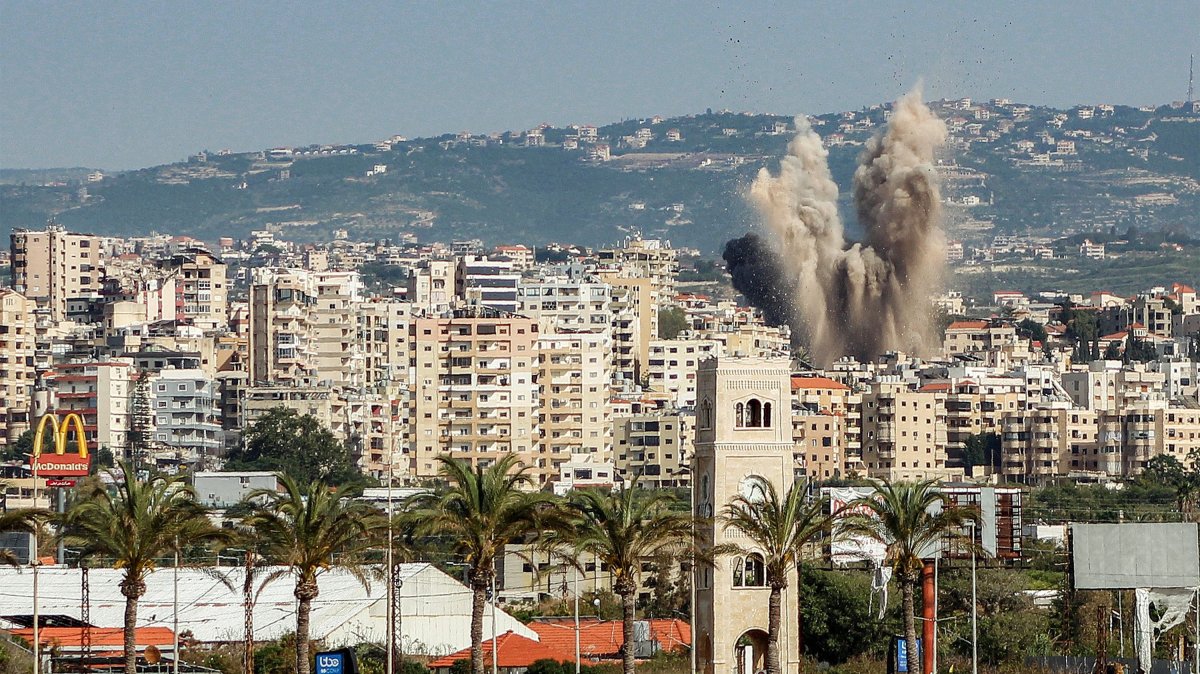 An explosion erupts in the area of al-Housh following Israeli bombardment as seen from Tyre, southern Lebanon, May 12, 2026. (AFP Photo)