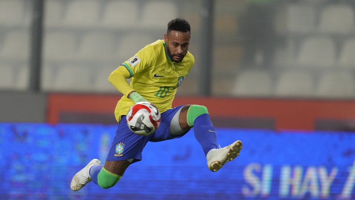 Brazil's Neymar controls the ball during a qualifying match for the FIFA World Cup 2026 against Peru at National stadium, Lima, Peru, Sept. 12, 2023. (AP Photo)
