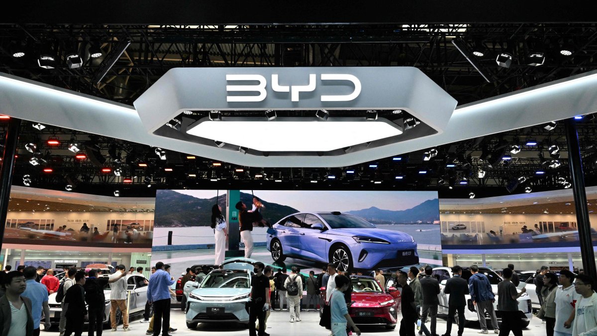 People visit the BYD booth at the Beijing Auto Show in Beijing, China, April 30, 2026. (AFP Photo)