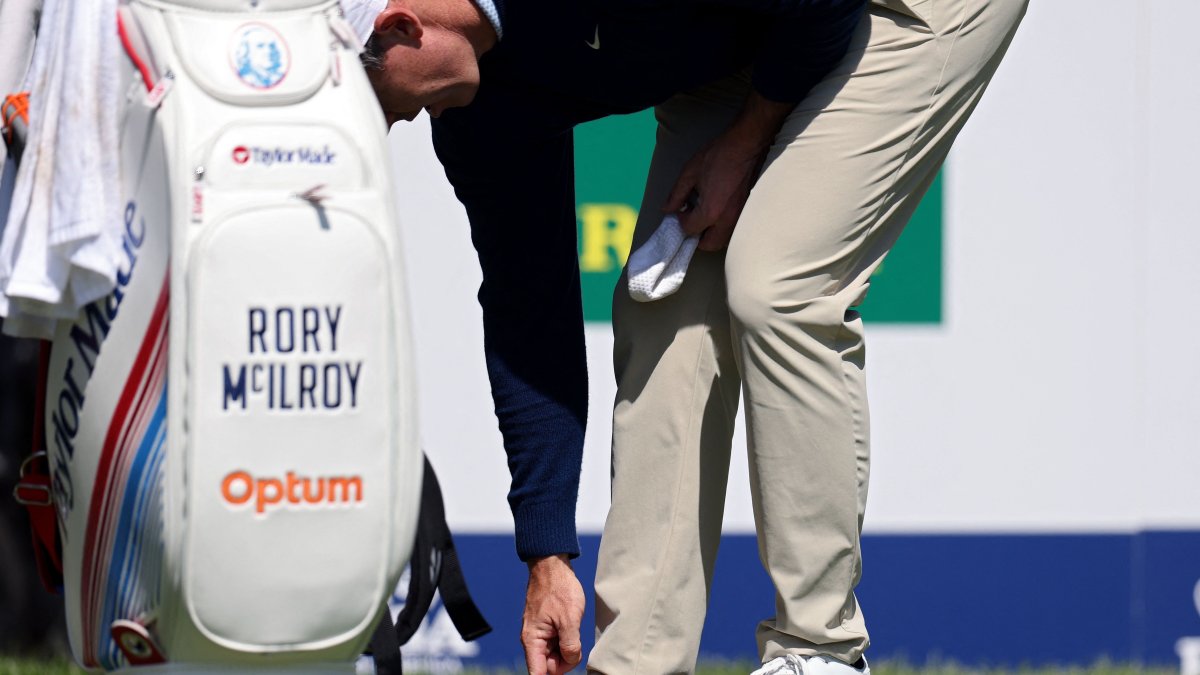 Rory McIlroy looks at his foot on the fourth tee during a practice round prior to the PGA Championship at Aronimink Golf Club, Newtown, U.S., May 12, 2026. (AP Photo)