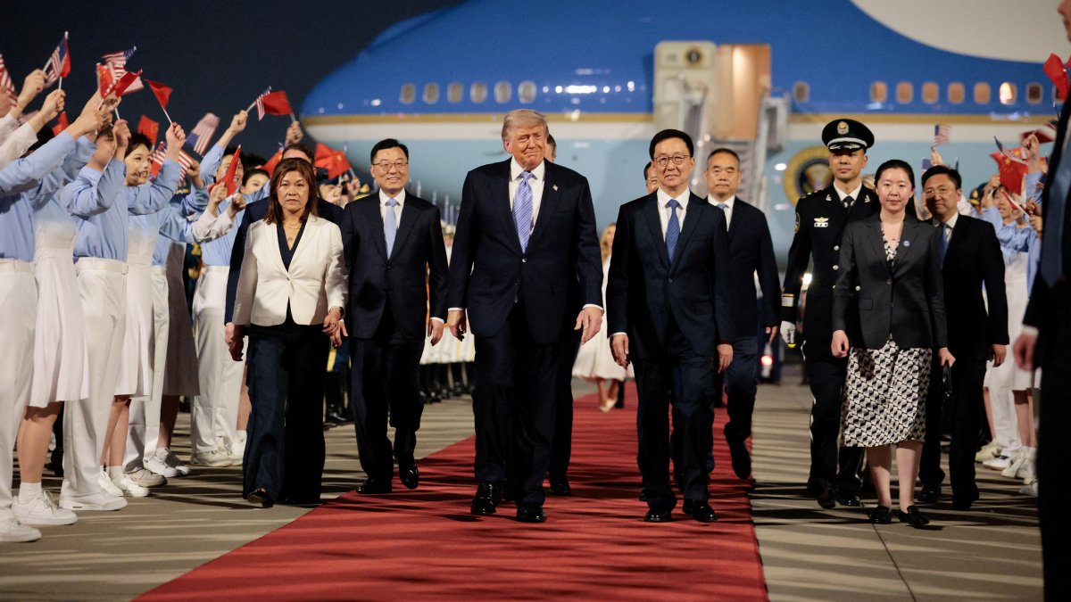 U.S. President Donald Trump walks with Chinese Vice President Han Zheng during an arrival ceremony at Beijing Capital International Airport, Beijing, China, May 13, 2026. (Reuters Photo)