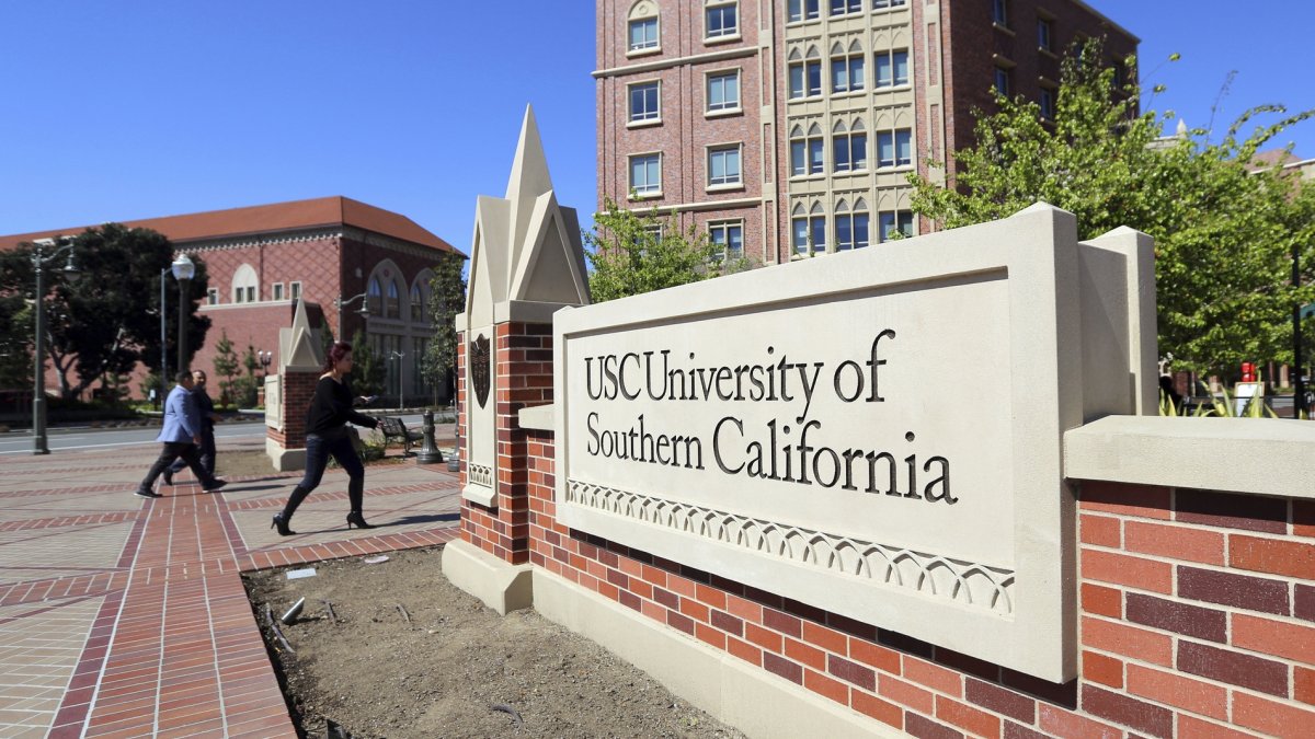 People walk onto the University of Southern California campus in Los Angeles, California, U.S., March 12, 2019. (AP Photo)