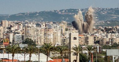 An explosion erupts in the area of al-Housh following Israeli bombardment as seen from Tyre, southern Lebanon, May 12, 2026. (AFP Photo)