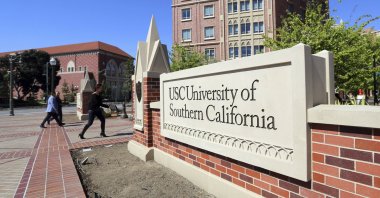 People walk onto the University of Southern California campus in Los Angeles, California, U.S., March 12, 2019. (AP Photo)