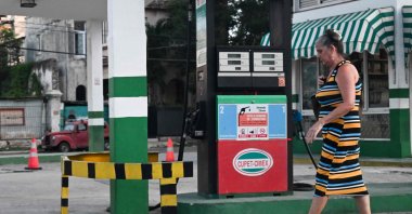 A woman walks past an empty petrol station in Havana, Cuba, May 13, 2026. (AFP Photo)