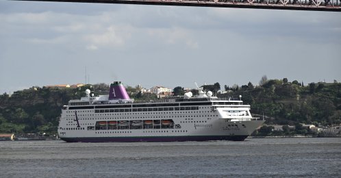 The MS Ambition cruise ship sails the Tagus River in Lisbon, Portugal, March 26, 2025. (Getty Images Photo)