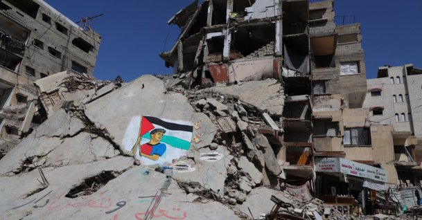 A mural painted by Palestinian artists depicts soccer star Lamine Yamal, who waved a Palestinian flag during Barcelona&amp;#039;s LaLiga victory parade, on the rubble of buildings destroyed during the war, at Shati (Beach) refugee camp in Gaza City, May 13, 2026. (Reuters Photo)