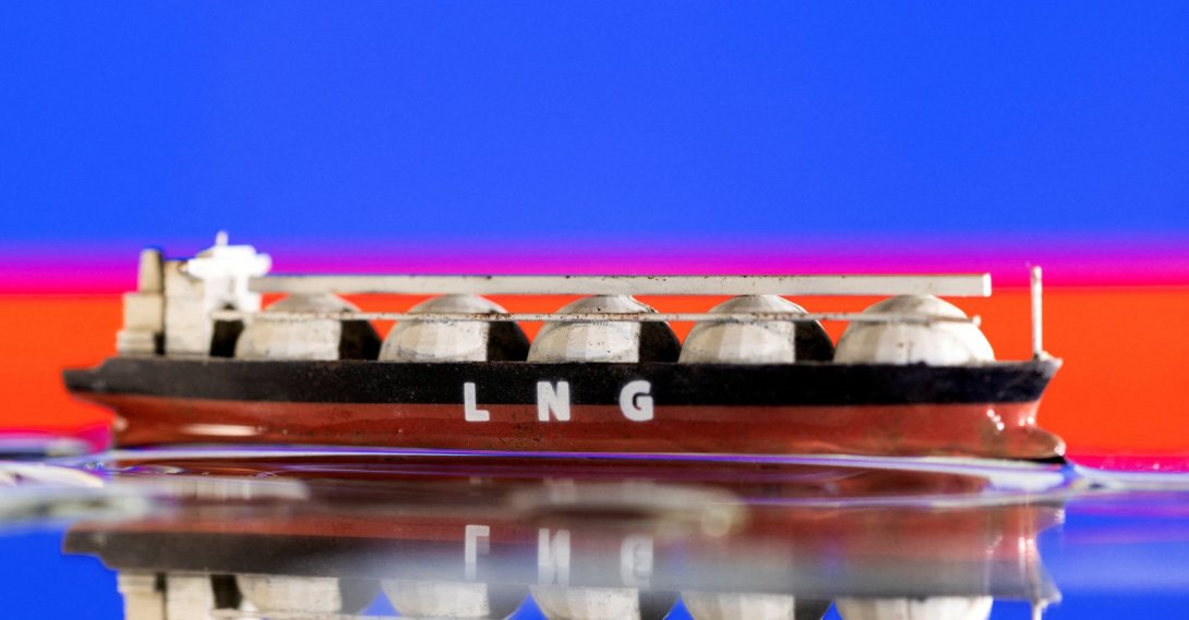 A model of an LNG tanker is seen in front of Russia's flag in this illustration taken May 19, 2022. (Reuters Photo)