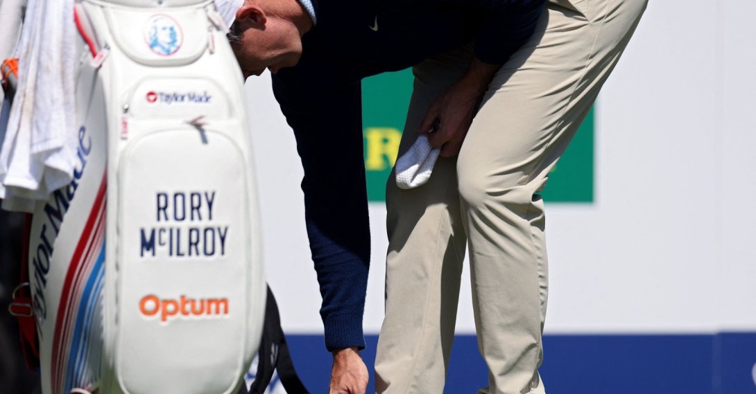 Rory McIlroy looks at his foot on the fourth tee during a practice round prior to the PGA Championship at Aronimink Golf Club, Newtown, U.S., May 12, 2026. (AP Photo)