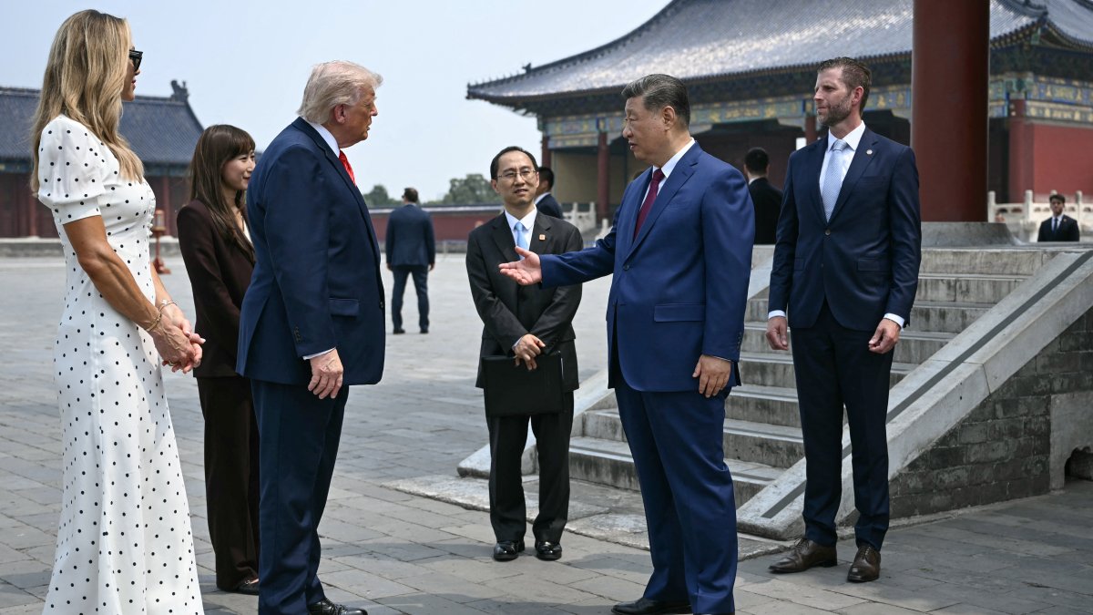 China's President Xi Jinping (2nd R) and U.S. President Donald Trump (2nd L) talk during a visit to the Temple of Heaven in Beijing, China, May 14, 2026. (Reuters Photo)