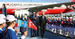 President Recep Tayyip Erdoğan is welcomed by Kazakh President Kassym-Jomart Tokayev upon his arrival for the informal summit of the Organization of Turkic States, at the Astana Airport, Astana, Kazakhstan, May 13, 2026. (IHA Photo)
