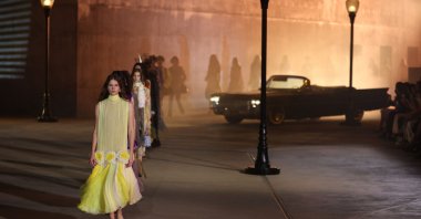 Models walk the runway during the Dior 2027 Cruise collection fashion show at the Los Angeles County Museum of Art (LACMA), Los Angeles, U.S., on May 13, 2026. (AFP Photo)