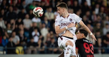 Trabzonspor's Ernest Muçi (L) battles for the ball during the Turkish Cup semifinal match against Gençlerbirliği at Eryaman Stadium, Ankara, Türkiye, May 13, 2026. (AA Photo)
