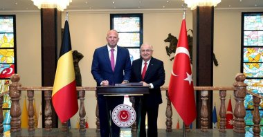 This handout photograph taken and released by the Defense Ministry shows Defense Minister Yaşar Güler (R) and Belgium's Defense and Foreign Trade Minister Theo Francken posing ahead of their meeting, Ankara, Türkiye, May 13, 2026. (AFP Photo)