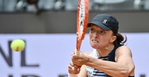 Poland's Iga Swiatek hits a return to USA's Jessica Pegula during the ATP Rome Open tennis tournament at Foro Italico, Rome, Italy, May 13, 2026. (AFP Photo)