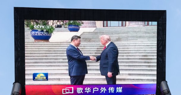  A screen shows Chinese President Xi Jinping shaking hands with U.S. President Donald Trump during their meeting in Beijing, China, May 14, 2026. (EPA Photo)
