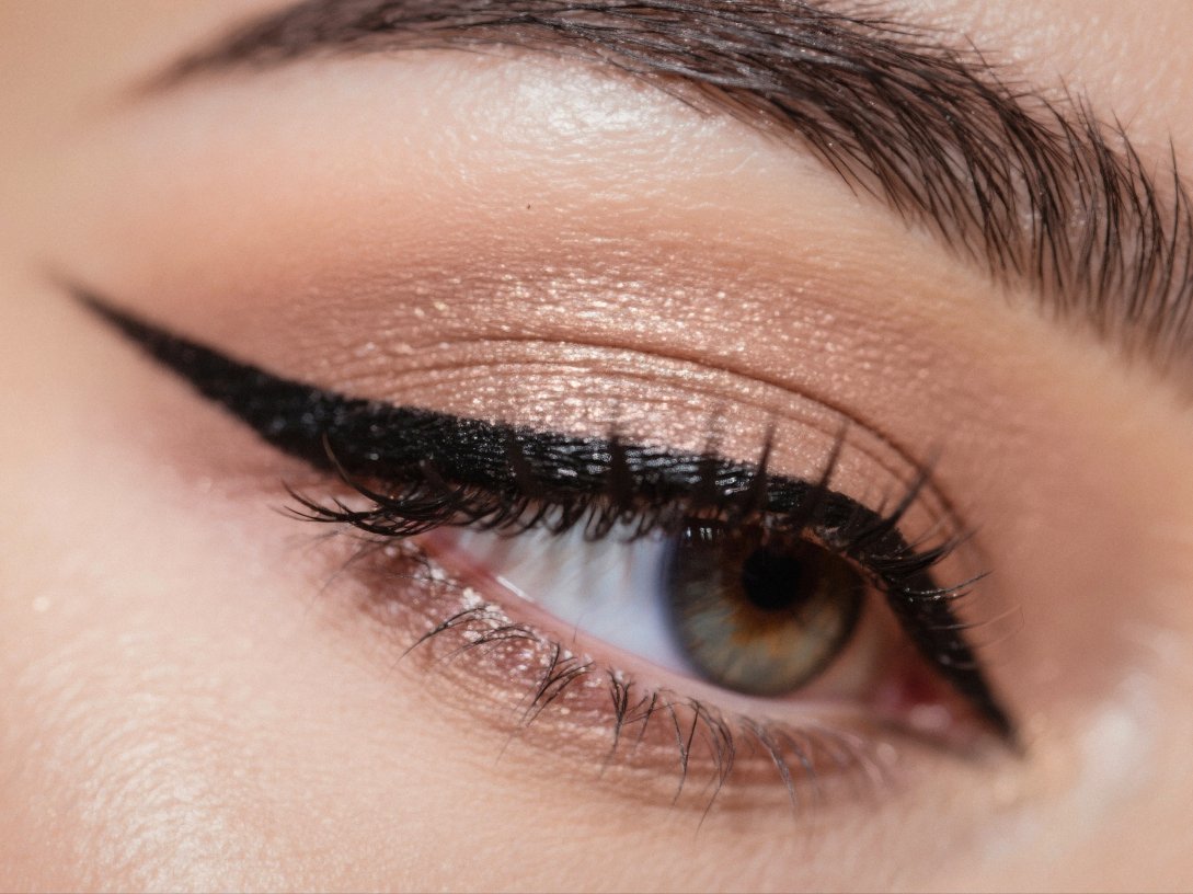 A close-up view of an eye, featuring a sharp winged eyeliner, eyeshadow and defined lashes. (Shutterstock Photo)