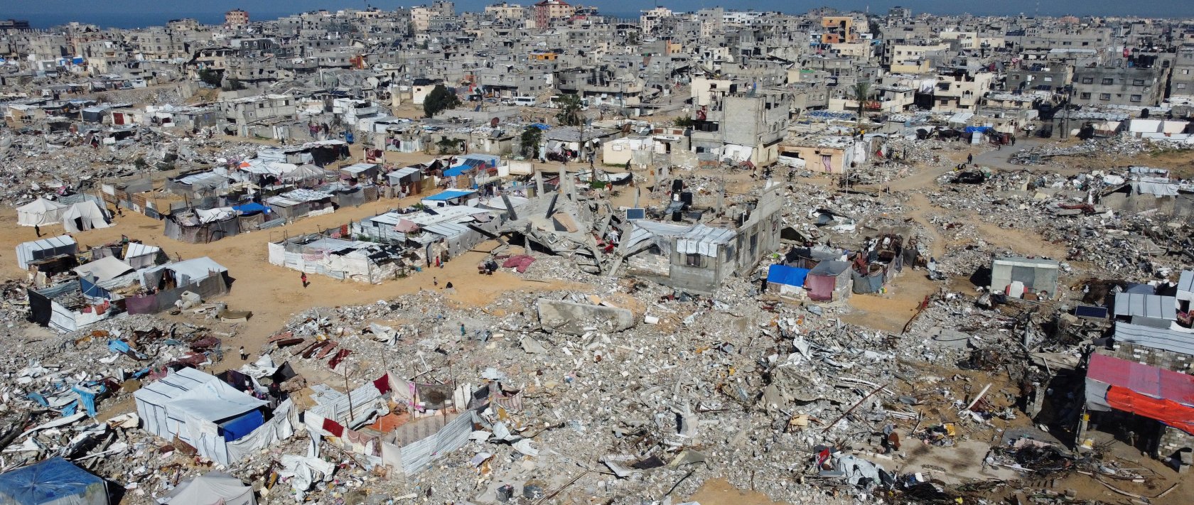 A drone view shows damaged and destroyed buildings, destroyed in the Israeli attacks, in Khan Younis in the southern Gaza Strip, Jan. 24, 2025. (Reuters File Photo)