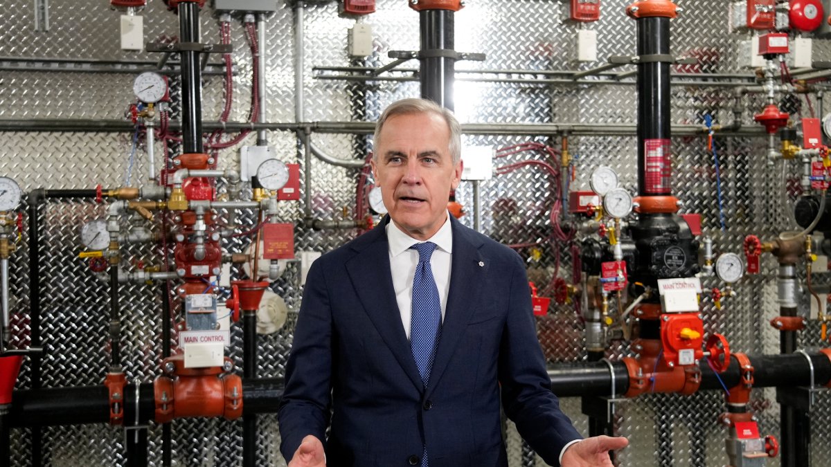 Canada's Prime Minister Mark Carney speaks as he meets unionized skilled trades workers at the United Association of Journeymen and Apprentices of the Plumbing and Pipefitting Industry of the United States and Canada (UA) office in Calgary, Alberta, Canada, May 15, 2026.  (Reuters Photo)