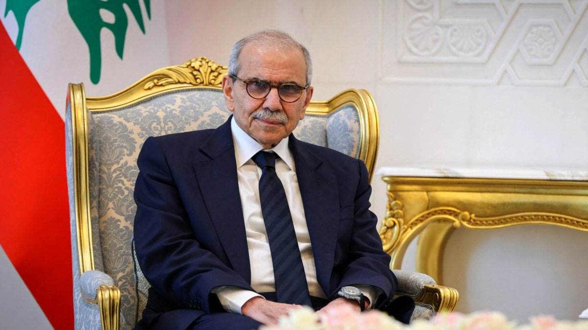 This handout photo provided by Syria's SANA news agency's Telegram channel on May 9, 2026, shows Lebanese Prime Minister Nawaf Salam meeting with the Syrian president at the People's Palace in Damascus. (Photo by SANA via AFP)
