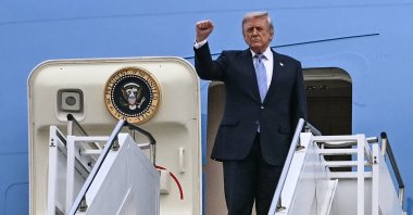 U.S. President Donald Trump boards Air Force One before he departs from Beijing Capital Airport, Beijing, China, May 15, 2026. (AFP Photo)