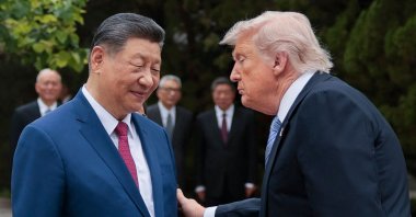 U.S. President Donald Trump (R) gestures to China's President Xi Jinping as he leaves after a visit to Zhongnanhai Garden, Beijing, China, May 15, 2026. (AFP Photo)