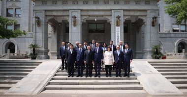 Environment, Urbanization and Climate Change Minister Murat Kurum (C-R) and China's Housing and Urban-Rural Development Minister Ni Hong (C-L) pose after a meeting, Beijing, China, May 13, 2026. (AA Photo)