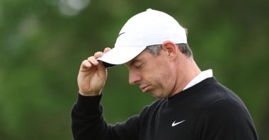 Rory McIlroy looks on from the ninth green during the first round of the PGA Championship at Aronimink Golf Club, Newtown, U.S., May 14, 2026. (AFP Photo)