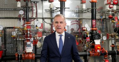 Canada's Prime Minister Mark Carney speaks as he meets unionized skilled trades workers at the United Association of Journeymen and Apprentices of the Plumbing and Pipefitting Industry of the United States and Canada (UA) office in Calgary, Alberta, Canada, May 15, 2026.  (Reuters Photo)