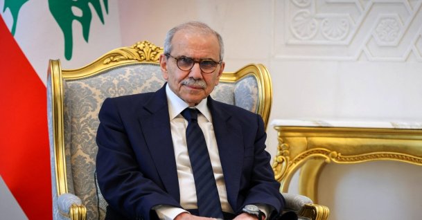 This handout photo provided by Syria's SANA news agency's Telegram channel on May 9, 2026, shows Lebanese Prime Minister Nawaf Salam meeting with the Syrian president at the People's Palace in Damascus. (Photo by SANA via AFP)