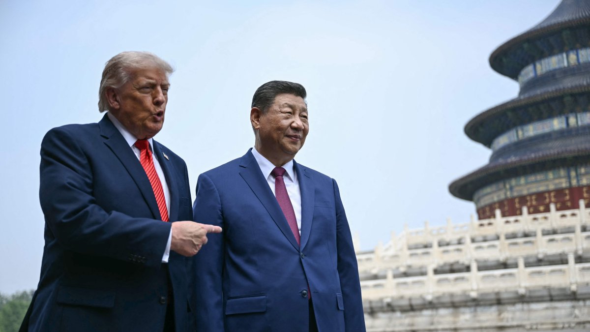 China's President Xi Jinping (R) and U.S. President Donald Trump visit the Temple of Heaven in Beijing, China, May 14, 2026. (AFP Photo)