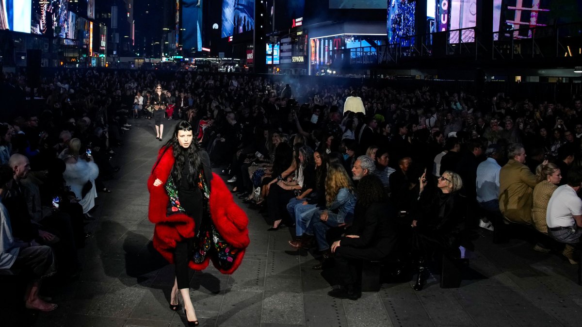 A model presents a creation from the Gucci Cruise 2027 collection at Times Square, New York City, U.S., May 16, 2026. (Reuters Photo)
