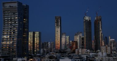 A city skyline with apartment blocks and office buildings under construction, Tel Aviv, Israel, April 22, 2026. (Reuters Photo)