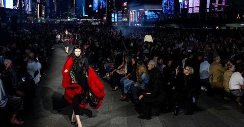 A model presents a creation from the Gucci Cruise 2027 collection at Times Square, New York City, U.S., May 16, 2026. (Reuters Photo)