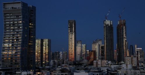 A city skyline with apartment blocks and office buildings under construction, Tel Aviv, Israel, April 22, 2026. (Reuters Photo)