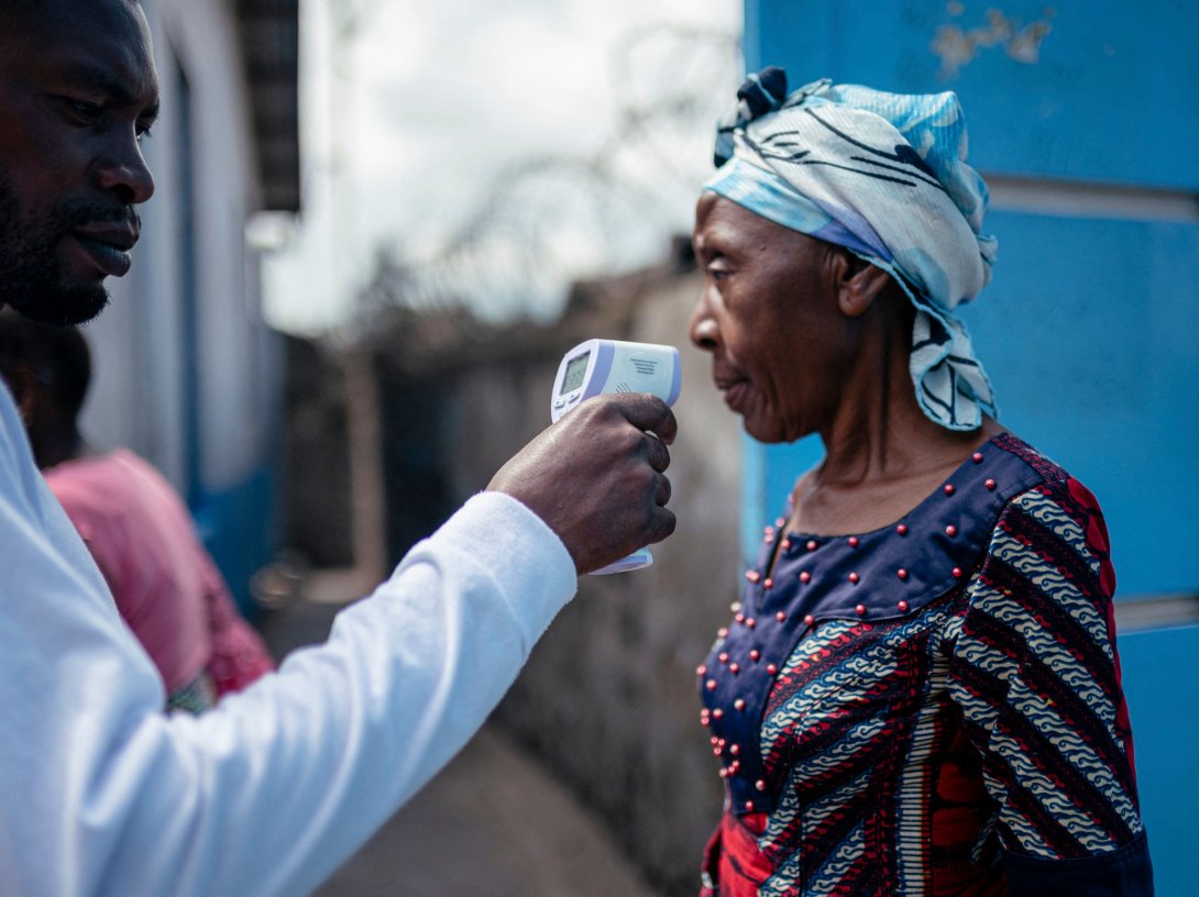Hospital staff checks a visitor’s temperature using a contactless infrared thermometer, in Goma, DR Congo, May 17, 2026. (AFP Photo)