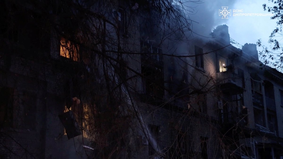 Emergency personnel work at the site of an apartment building damaged during Russian drone and missile strikes, amid Russia's attack on Ukraine, Dnipro, Ukraine, May 18, 2026. (Reuters Photo)