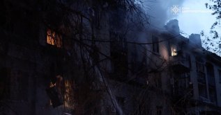 Emergency personnel work at the site of an apartment building damaged during Russian drone and missile strikes, amid Russia's attack on Ukraine, Dnipro, Ukraine, May 18, 2026. (Reuters Photo)