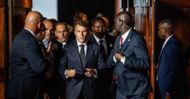 France's President Emmanuel Macron (C) and the Central African Republic's President Faustin Archange Touadera (3rd R) walk during the Africa Forward Summit at the Kenyatta International Convention Centre (KICC), Nairobi, Kenya, May 12, 2026. (AFP Photo)