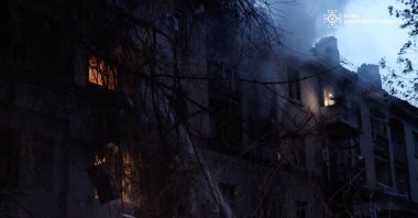 Emergency personnel work at the site of an apartment building damaged during Russian drone and missile strikes, amid Russia's attack on Ukraine, Dnipro, Ukraine, May 18, 2026. (Reuters Photo)