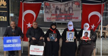 Families whose children were abducted by the PKK terrorist group continued their weekly Wednesday protests in front of the DEM Party provincial headquarters, where they gathered carrying photos of their children and calling on them to surrender and return home, Muş, Türkiye, May 6, 2026. (AA Photo)